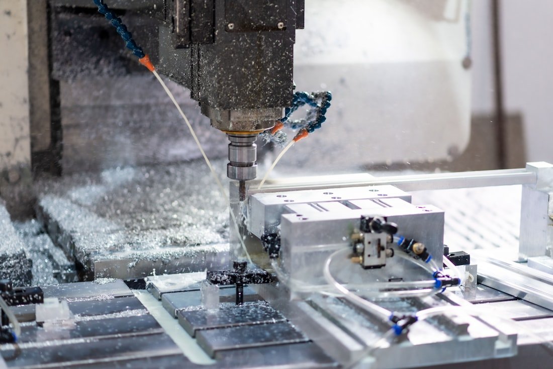 CNC machining centre cutting a precision component